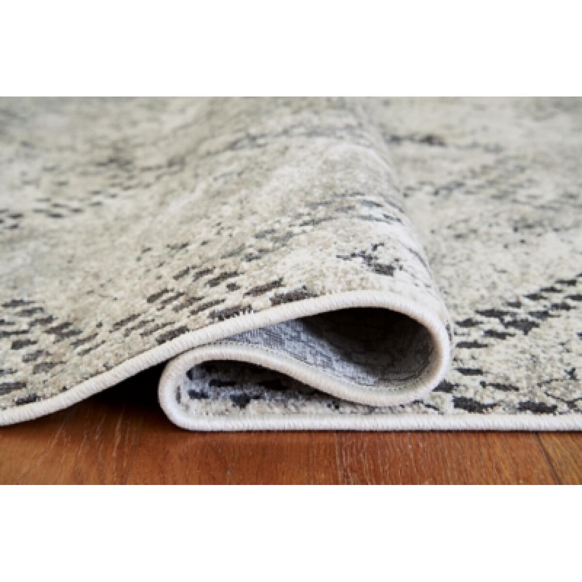 Poincilana 5′ x 7′ Rug Rugs Ashley Furniture 10