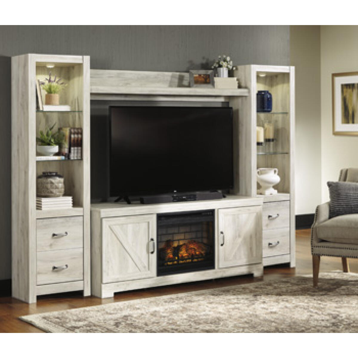 1c52b785fa4895af33725fa9ce1ab323 Bellaby 4-Piece Entertainment Center with Electric Fireplace - Image 1